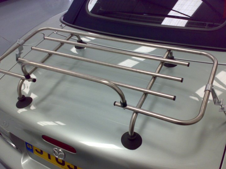 aluminum and chrome car boot rack